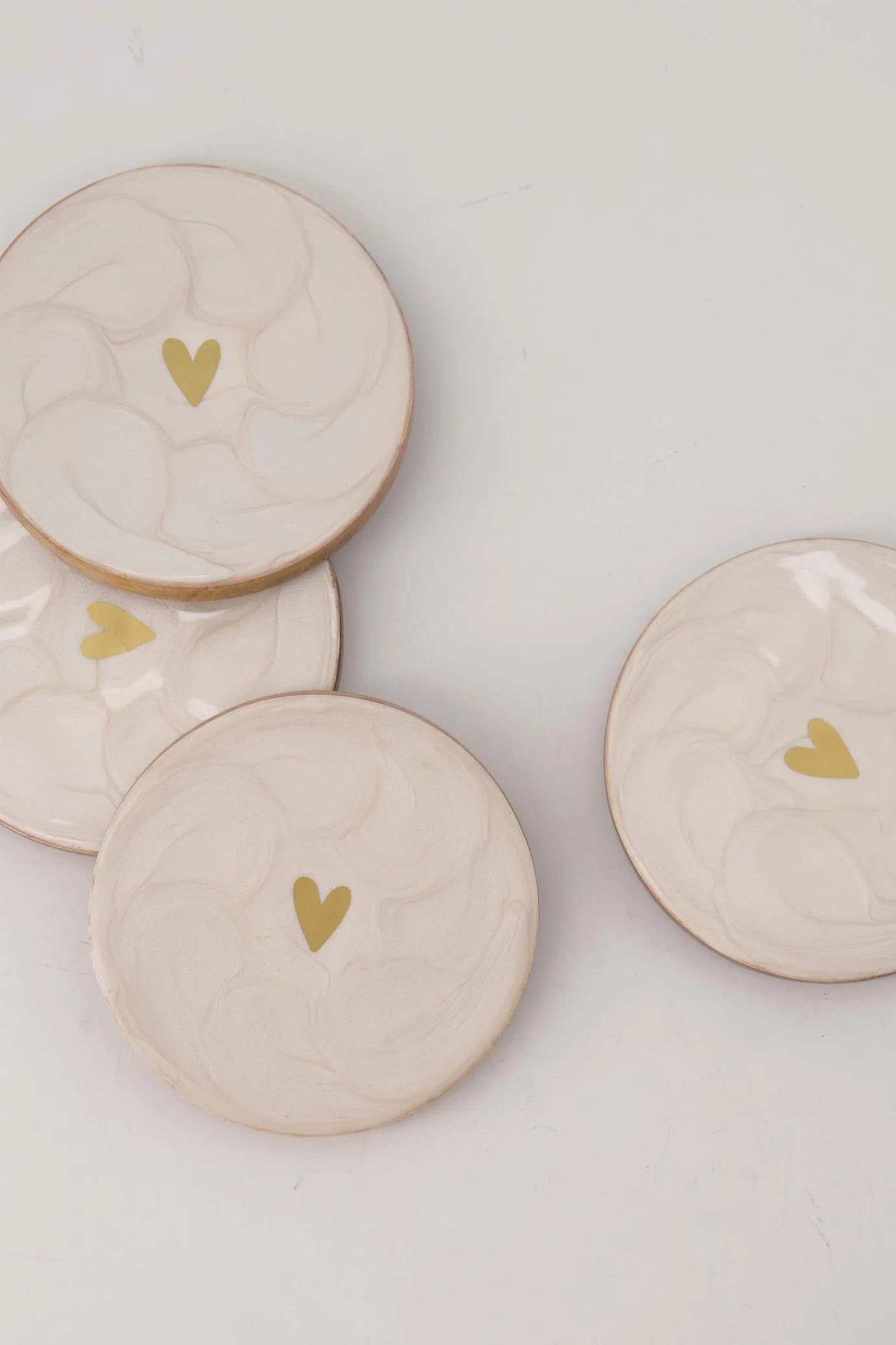 Zusss set van 4 onderzetters parelmoer hartje