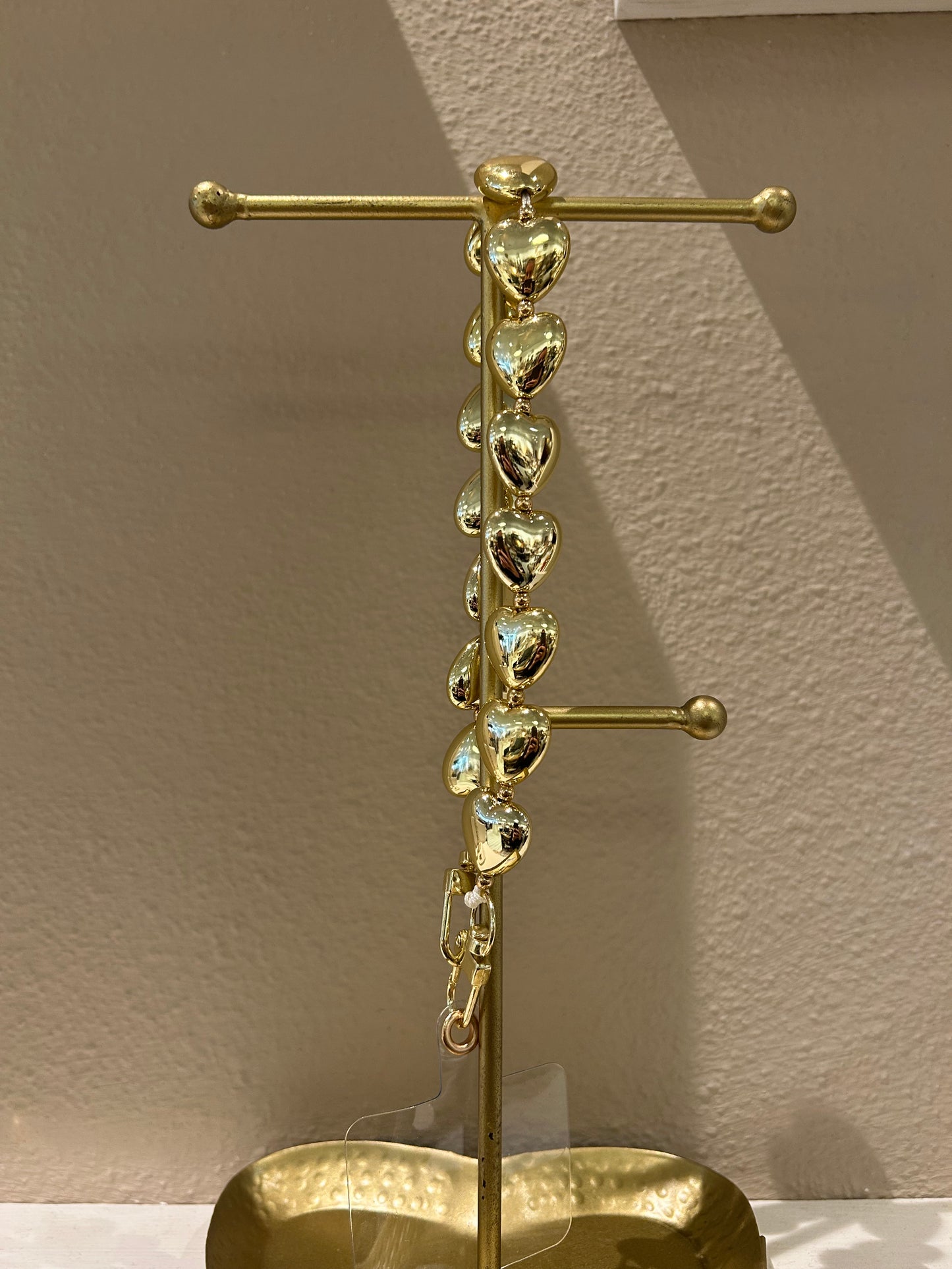 Universeel telefoonkoord hartjes goud