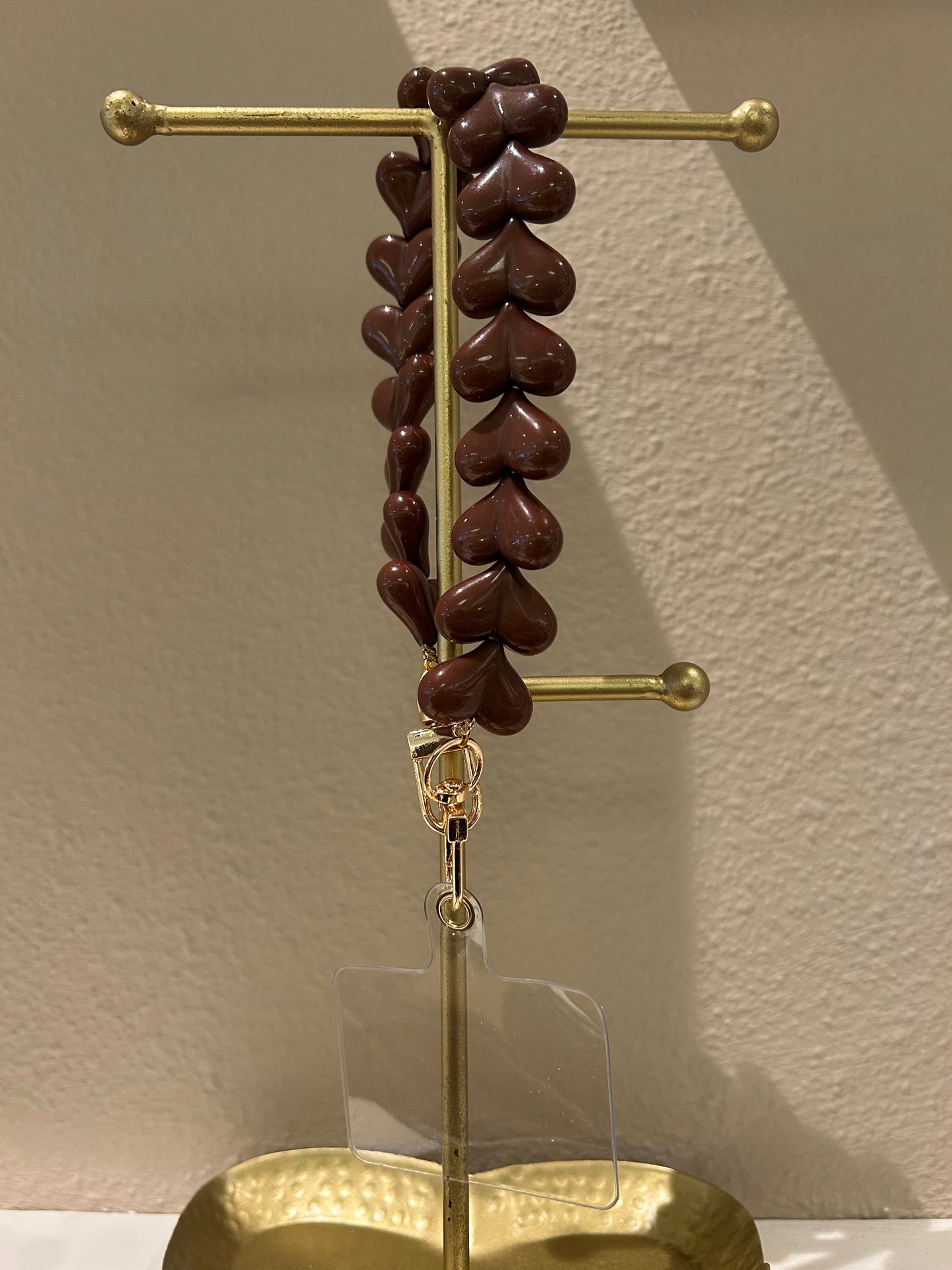 Universeel telefoonkoord hartjes bruin