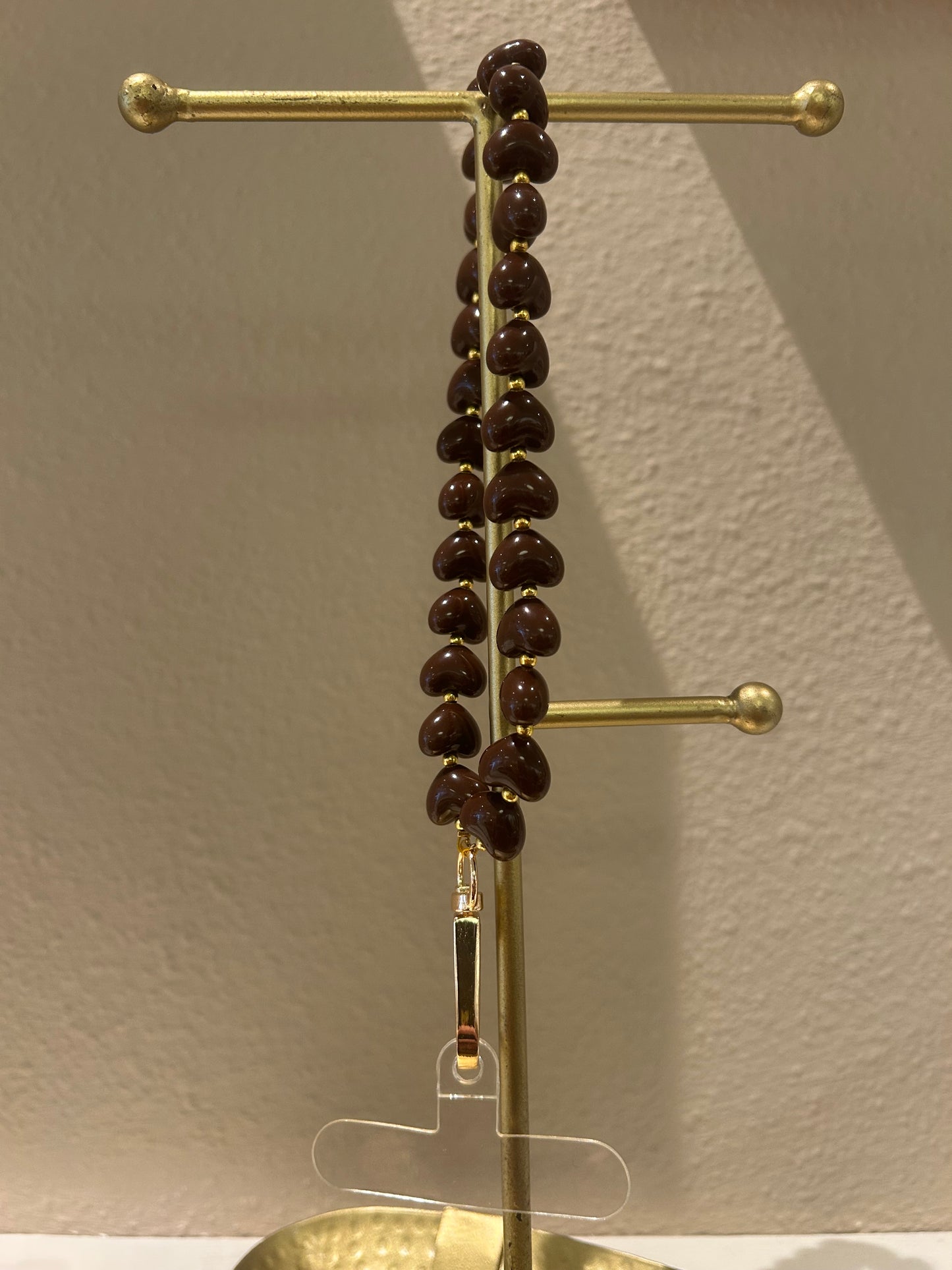 Universeel telefoonkoord kleine hartjes donkerbruin