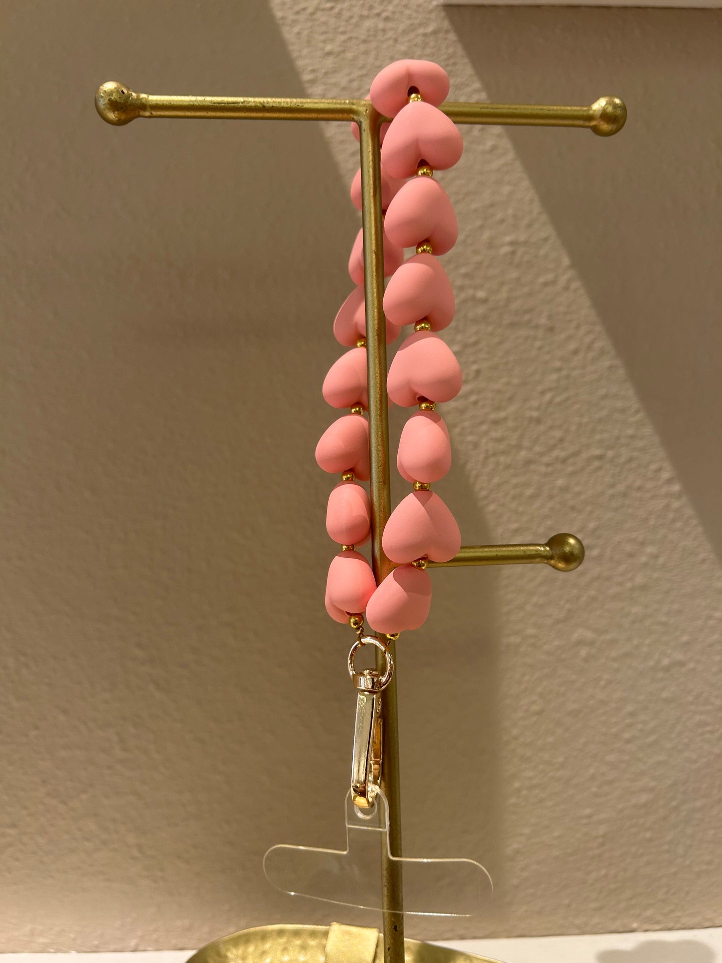 Universeel telefoonkoord hartjes mat roze