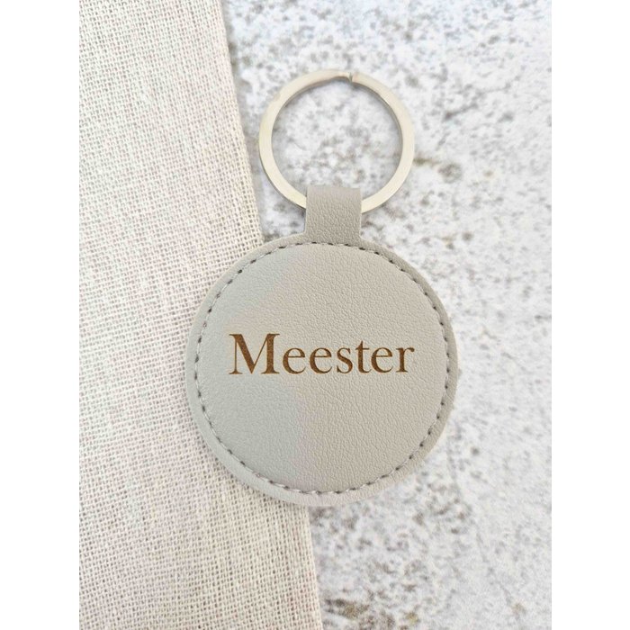 Leren sleutelhanger - Rond grijs meester