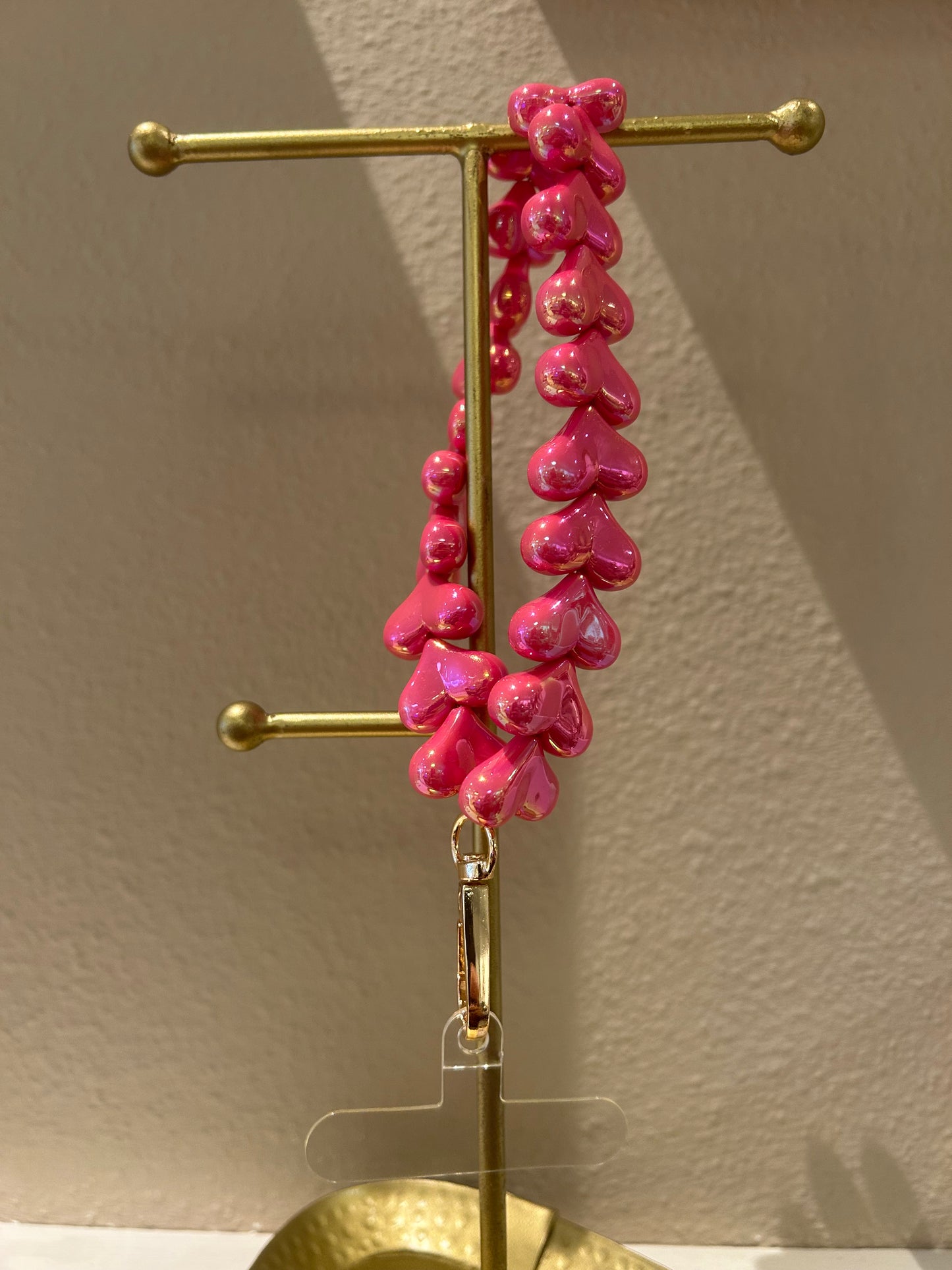 Universeel telefoonkoord hartjes hard roze