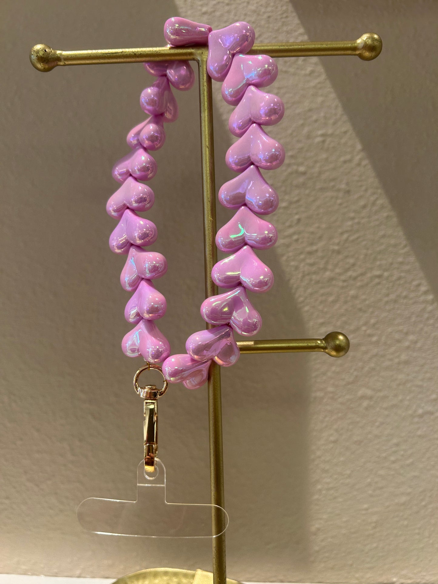 Universeel telefoonkoord hartjes shiny paars